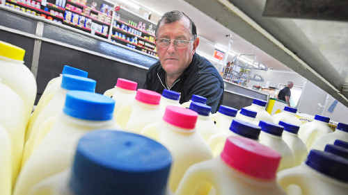 Owner of 5 Star Supermarket Ted Heffernan says the downward pressure on milk prices will affect local corner stores. Owner of 5 Star Supermarket Ted Heffernan says the downward pressure on milk prices will affect local corner stores.
